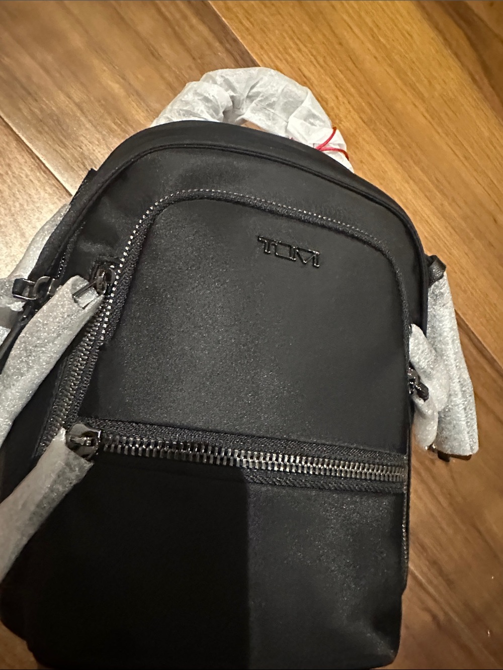 Tumi Black Mini Backpack with Front Zip Pocket